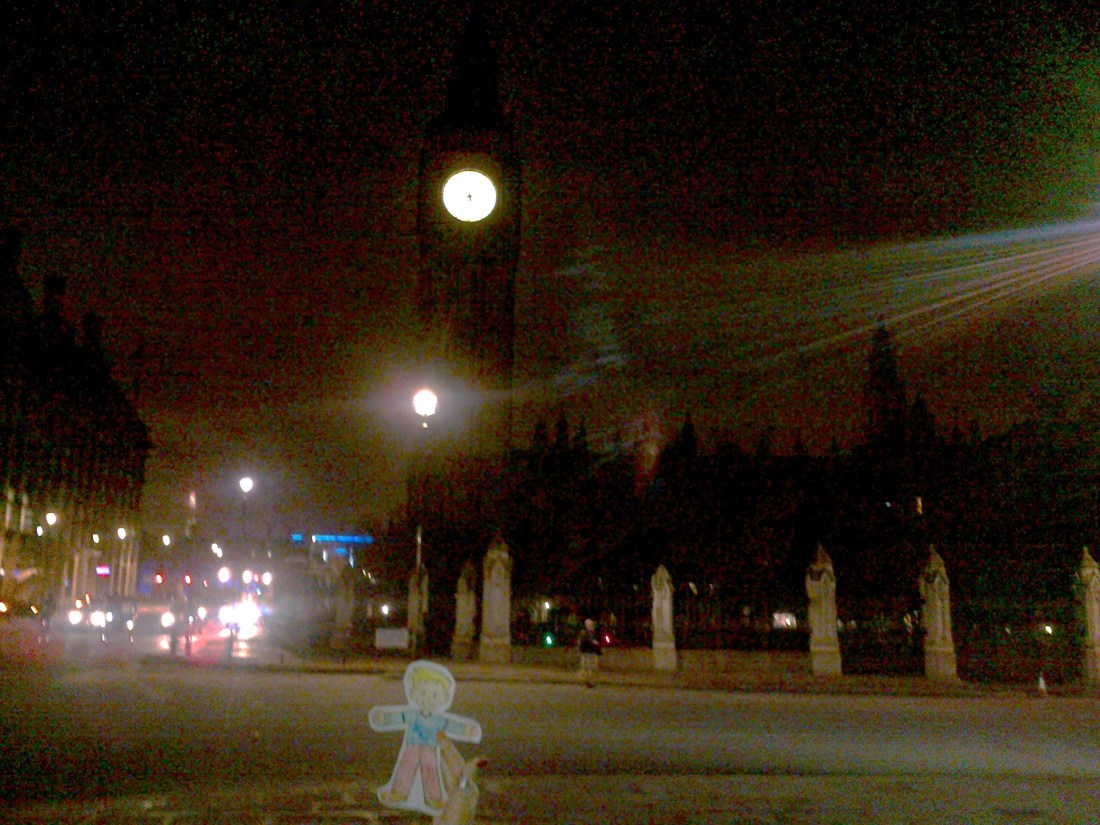 Flat Stanley, a book character cut out, visiting Big Ben