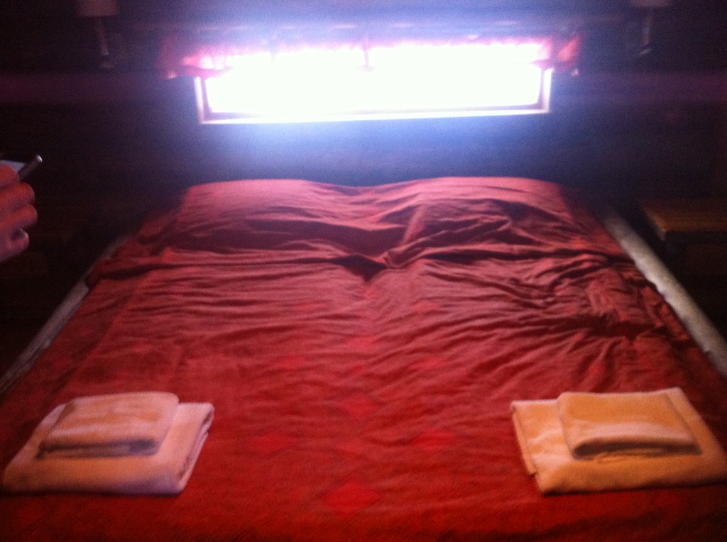 Bed and midnight sun-orange duvet